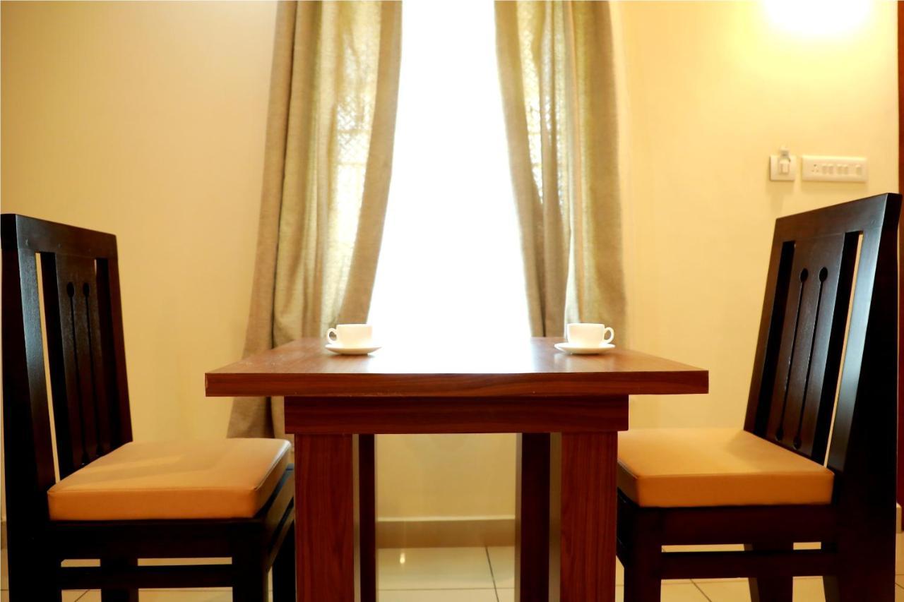 Wayanad Royal Crown Hotel Kalpetta Bagian luar foto